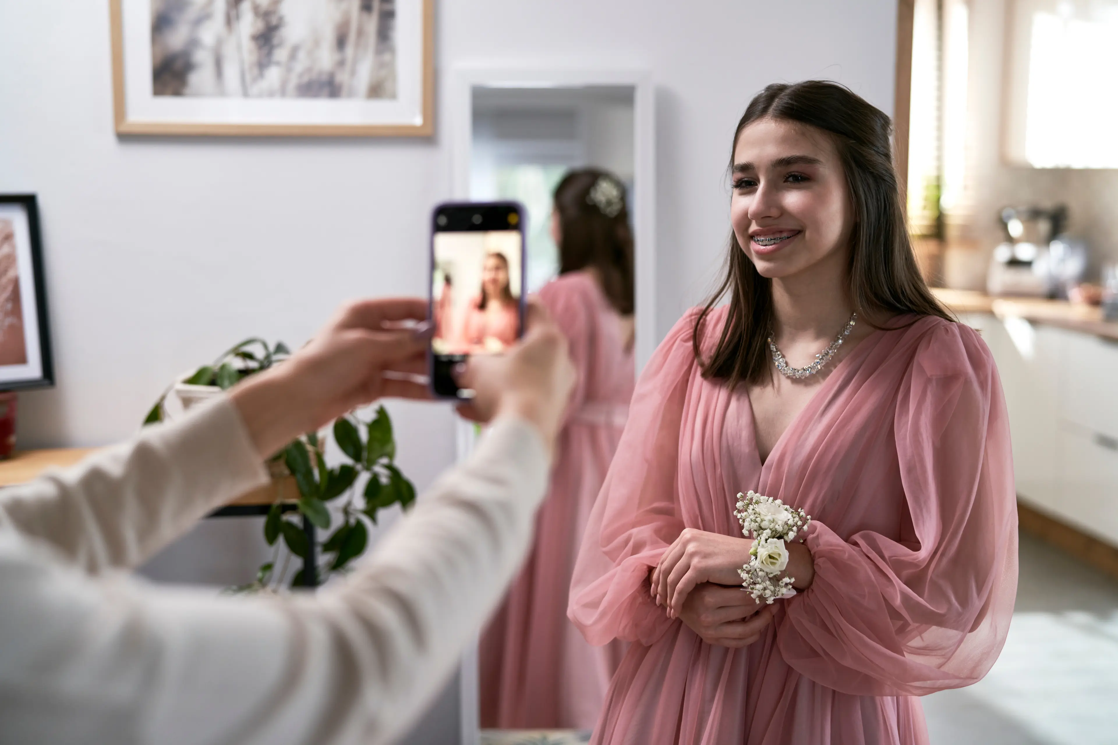 Taking a picture of a bridesmaid